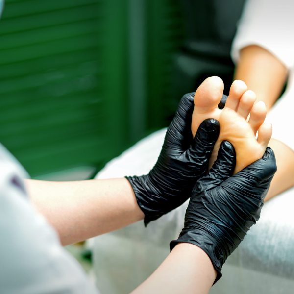 beautician-in-protective-rubber-gloves-doing-massa-2025-10-14-10-18-35-utc